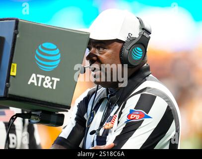 referee-larry-smith-watches-a-
