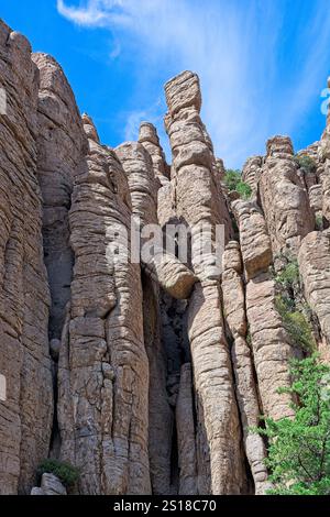 Looking skyward at rhyolite pinnacle formations at Chiricahua National Monument Stock Photo