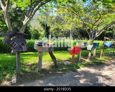A row of rustic rural postboxes, Stamford Valley, Queensland, QLD, Australia Stock Photo
