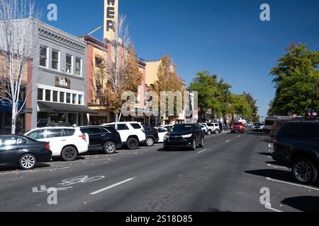 View looking up Wall Street lined with shops and restaurants in downtown Bend, Oregon Stock Photo