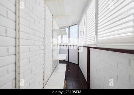 A Bright and Modern Indoor Balcony Featuring Stylish White Brick Walls for Your Home Stock Photo