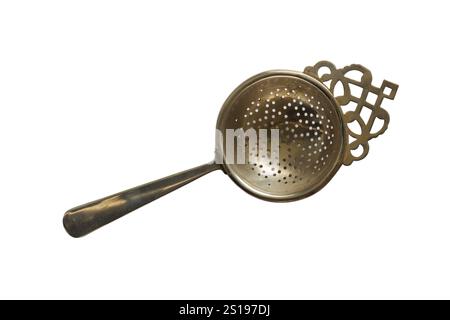 Vintage silver plated tea strainer isolated on white background - electroplated nickel silver EPNS Stock Photo