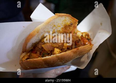 mixed meat street food in bread from chez omar derb dabachi off jemaa el-fna square marrakesh, morocco Stock Photo