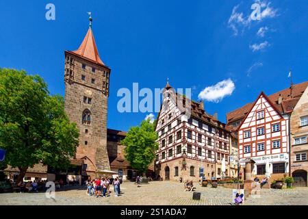 Germany, Bavaria, Franconia, Nuremberg, Old town, Platz am Tiergärtnertor square, City gate Tiergärtnertor and Pilate house or Pilatushaus dated 15th Stock Photo