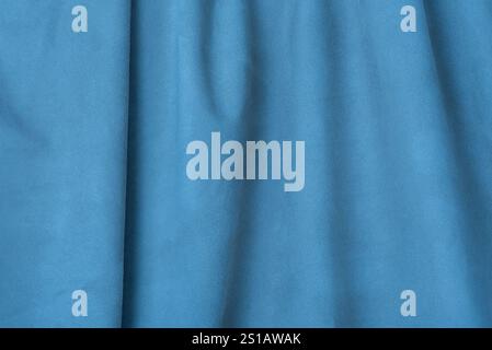 Blue suede background. Texture of suede leather dyed in light blue Stock Photo