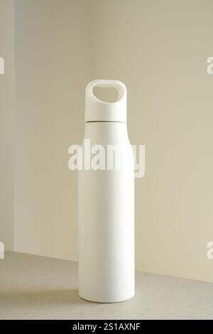 White Stainless Steel Water Bottle with handle on white background , Mockup Stock Photo