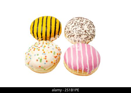 Four donuts of different colors and toppings. Donuts are laid out in a square on a white background. Stock Photo