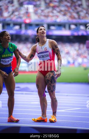 Ewa Swoboda participating in the 100 meters at the Paris 2024 Olympic