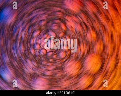 Dynamic, abstract, stientific background with blurry air bubbles. Swirling movement, orange-purple colors. Stock Photo