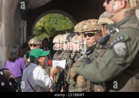 San Juan, USA. 02nd Jan, 2025. Environmental activists face off with police at the back entrance of the Puerto Rican Capitol Building during the government's swearing-in ceremony in San Juan, Puerto Rico on Jan. 2, 2025. (Carlos Berríos Polanco/Sipa USA) Credit: Sipa USA/Alamy Live News Stock Photo