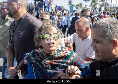 San Juan, USA. 02nd Jan, 2025. Security drags out a protester who interrupted Governor Jenniffer González Colón's swearing-in ceremony in San Juan, Puerto Rico on Jan. 2, 2025. (Carlos Berríos Polanco/Sipa USA) Credit: Sipa USA/Alamy Live News Stock Photo