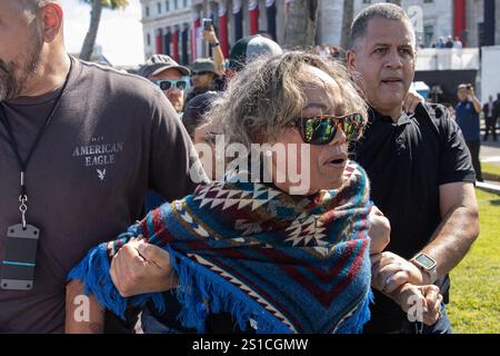 San Juan, USA. 02nd Jan, 2025. Security drags out a protester who interrupted Governor Jenniffer González Colón's swearing-in ceremony in San Juan, Puerto Rico on Jan. 2, 2025. (Carlos Berríos Polanco/Sipa USA) Credit: Sipa USA/Alamy Live News Stock Photo