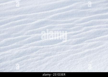 Abstract white winter snow surface wavy line textured background Stock Photo