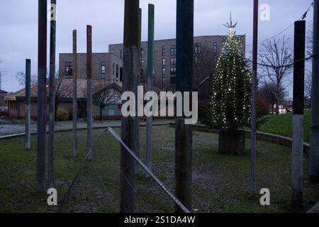 In the gloaming of dusk, in Govanhill, in Glasgow, Scotland, 31 December 2024. Stock Photo