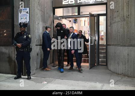 Jaia Cruz, a 24 year old female was arrested. She was in handcuffs and transported by the NYPD from the 28 Precinct after being charged in allegedly stabbing a USPS postal worker to death in a deli while working in Harlem. Thursday afternoon at approximately 2:38 PM, police responded to a 911 call for an assault inside of 168 Lenox Avenue. Upon arrival, officers observed a 36-year-old man victim identified as Ray Hodges with multiple stab wounds on the body. EMS responded and transported the man to NYC Health and Hospitals/Harlem where he was pronounced dead. (Photo by Kyle Mazza/SOPA Imag Stock Photo