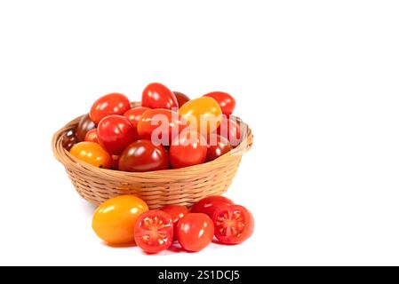 Various mini tomatoes against a white background Stock Photo
