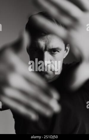 Portrait of charismatic man, black and white, close-up Stock Photo