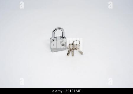 Locked Silver Padlock on a white background Stock Photo