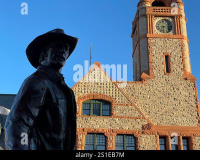 Cowboy statue and Cheyenne Depot Railroad Museum in historic downtown Cheyenne, Wyoming, USA Stock Photo