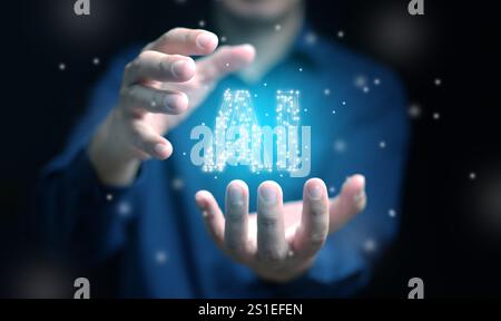 Artificial Intelligence concept. Hands of a man carry an AI text with circuit pattern, glowing bright in the dark. Ai technology. Stock Photo