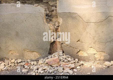 A crumbling wall on a house Stock Photo