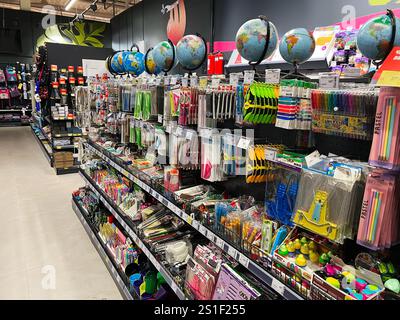 Kyiv, Ukraine - January 03, 2025: Shelves filled with neatly organized stationery, school supplies, and office items in a retail store. Stock Photo