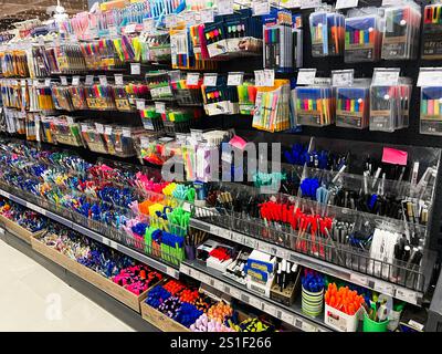 Kyiv, Ukraine - January 03, 2025: Variety of writing and drawing utensils neatly organized in a shop display. Stock Photo