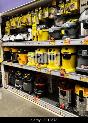 Kyiv, Ukraine - January 03, 2025: Store shelves showcasing a variety of modern industrial machines and accessories neatly arranged. Stock Photo