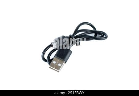 Black USB cable with micro USB connector neatly coiled and displayed on a plain white background, representing technology and connectivity Stock Photo
