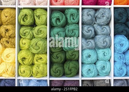 Colourful stacked wool placed in a box for presentation Stock Photo
