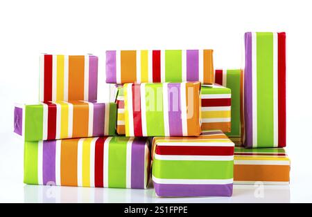 Colourful gift boxes cropped on a white background Stock Photo