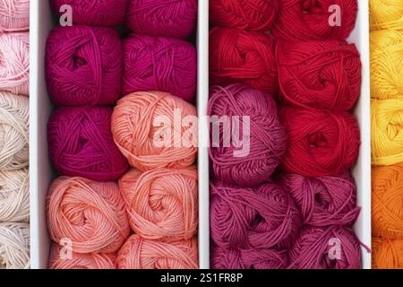 Colourful stacked wool placed in a box for presentation Stock Photo