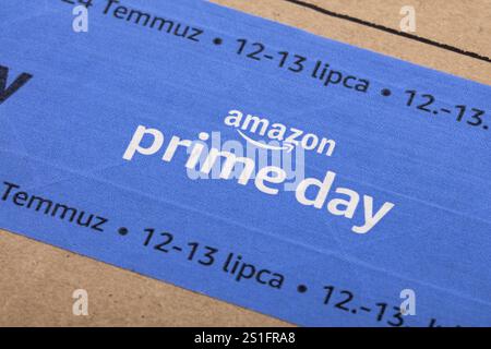 WETZLAR, Germany - 2022-07-16: Amazon Prime logotype printed on cardboard box security scotch tape. Amazon Prime is a service from Amazon which delive Stock Photo