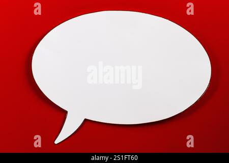 Empty speech bubble on red background Stock Photo