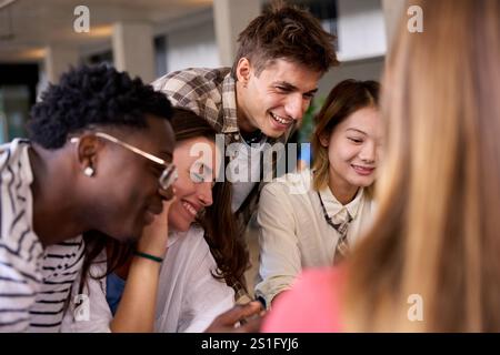 Group of international young language students together meeting looking something Stock Photo