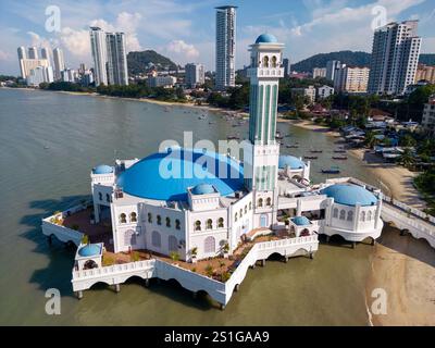 Drone aerial view of the Penang Floating Mosque or Masjid Terapung Pulau Pinang, also known as Tanjong Bungah Floating Mosque  or Masjid Terapung Tanj Stock Photo