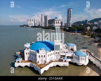 Drone aerial view of the Penang Floating Mosque or Masjid Terapung Pulau Pinang, also known as Tanjong Bungah Floating Mosque  or Masjid Terapung Tanj Stock Photo