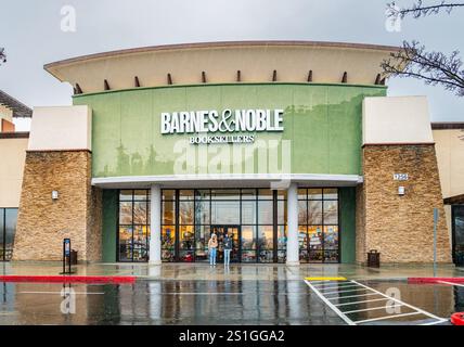 Photo of the front of a Barnes and Noble Store on a rainy day. The chain has made a surprising comeback in the U.S. with a new philosophy. Stock Photo