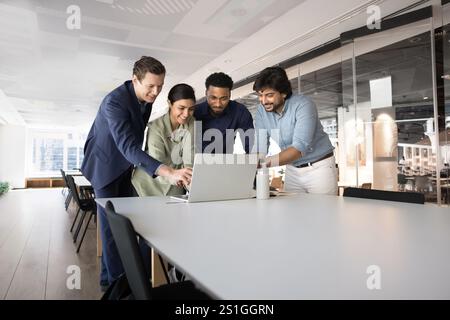 Diverse creative team working on online project together Stock Photo