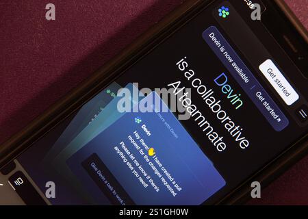 The website of Devin is displayed on an iPhone. Devin is a fully autonomous software engineering AI developed by Cognition, an AI startup company. Stock Photo
