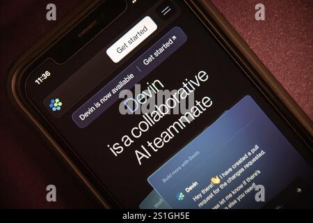 The website of Devin is displayed on an iPhone. Devin is a fully autonomous software engineering AI developed by Cognition, an AI startup company. Stock Photo