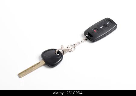 Car key with remote control isolated on white background. Modern car key Stock Photo