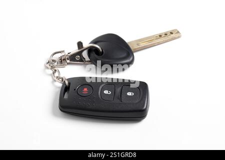 Car key with remote control isolated on white background. Modern car key Stock Photo