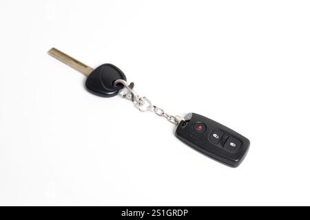 Car key with remote control isolated on white background. Modern car key Stock Photo