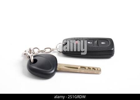 Car key with remote control isolated on white background. Modern car key Stock Photo
