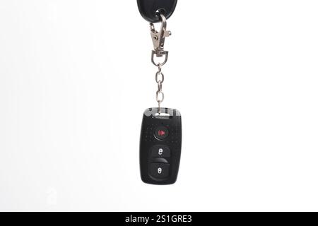 Car key with remote control isolated on white background. Modern car key Stock Photo