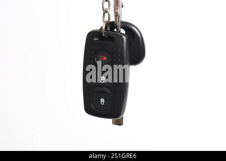 Car key with remote control isolated on white background. Modern car key Stock Photo