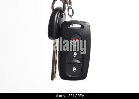 Car key with remote control isolated on white background. Modern car key Stock Photo