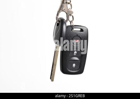 Car key with remote control isolated on white background. Modern car key Stock Photo