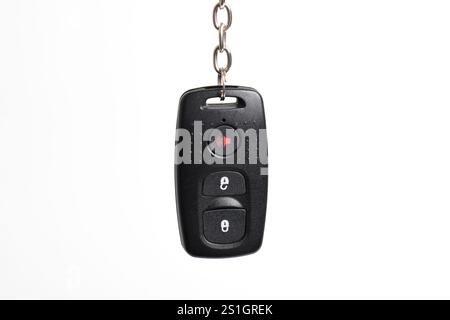 Car key with remote control isolated on white background. Modern car key Stock Photo